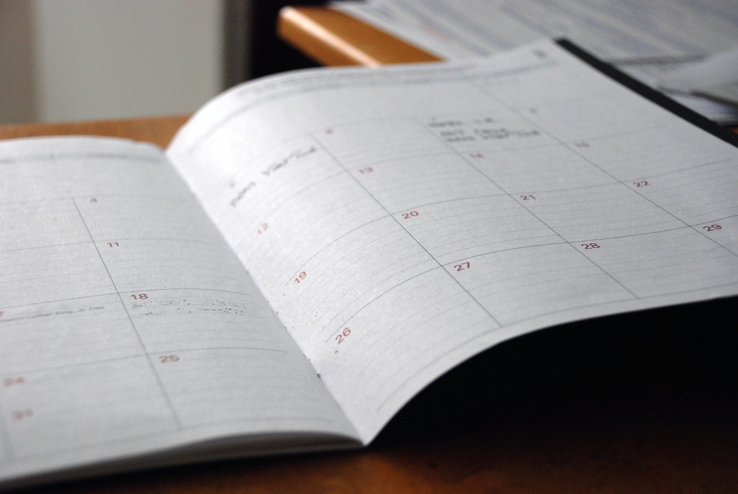A weekly calendar on the desk as we plan what's ahead